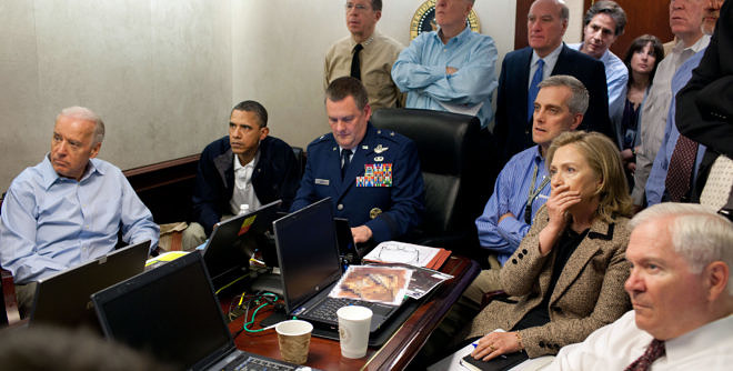 President Barack Obama and Vice President Joe Biden, along with with members of the national security team, receive an update on the mission against Osama bin Laden in the Situation Room of the White House, May 1, 2011. Please note: a classified document seen in this photograph has been obscured. (Official White House Photo by Pete Souza) This official White House photograph is being made available only for publication by news organizations and/or for personal use printing by the subject(s) of the photograph. The photograph may not be manipulated in any way and may not be used in commercial or political materials, advertisements, emails, products, promotions that in any way suggests approval or endorsement of the President, the First Family, or the White House.